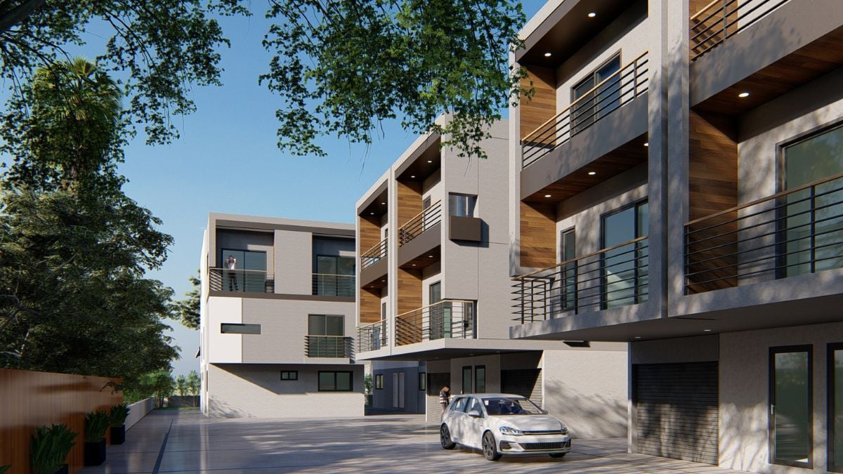 Contemporary multifamily housing development with balconies and modern urban architecture