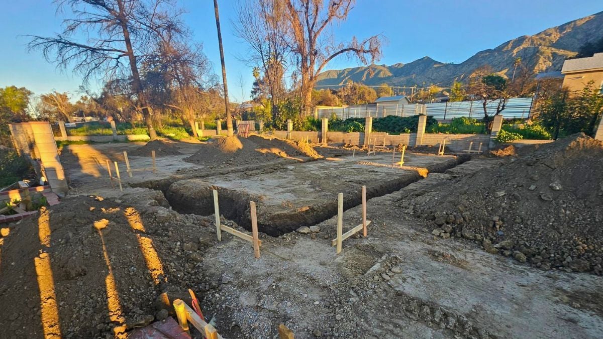 Foundation excavation and footing layout for new residential construction at Saint James Street project in Altadena