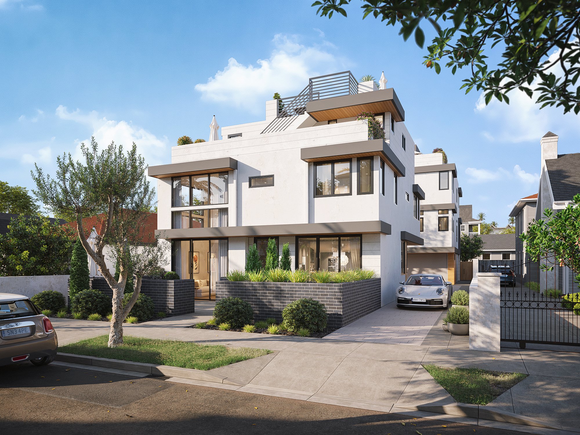 Modern multi-unit residential building with balconies and contemporary white exterior.