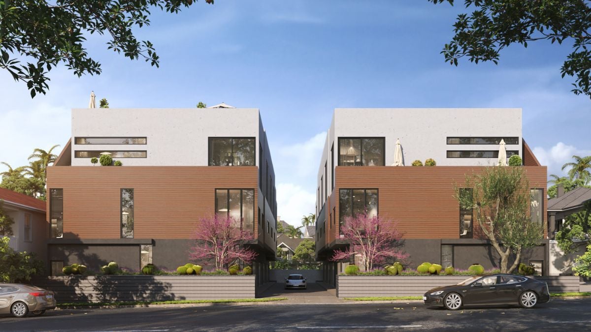 Modern townhouse development with mixed brick and stucco exterior in contemporary residential design