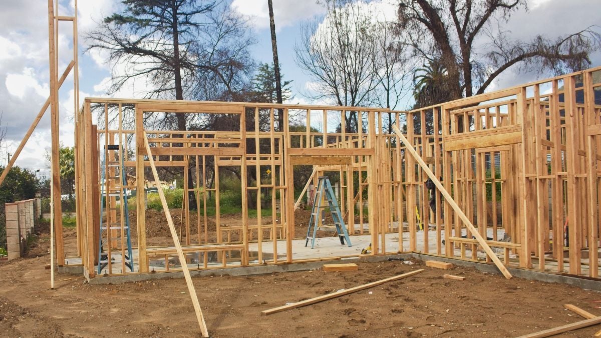 Wood framing structure for new custom home under construction at Saint James Street residential project