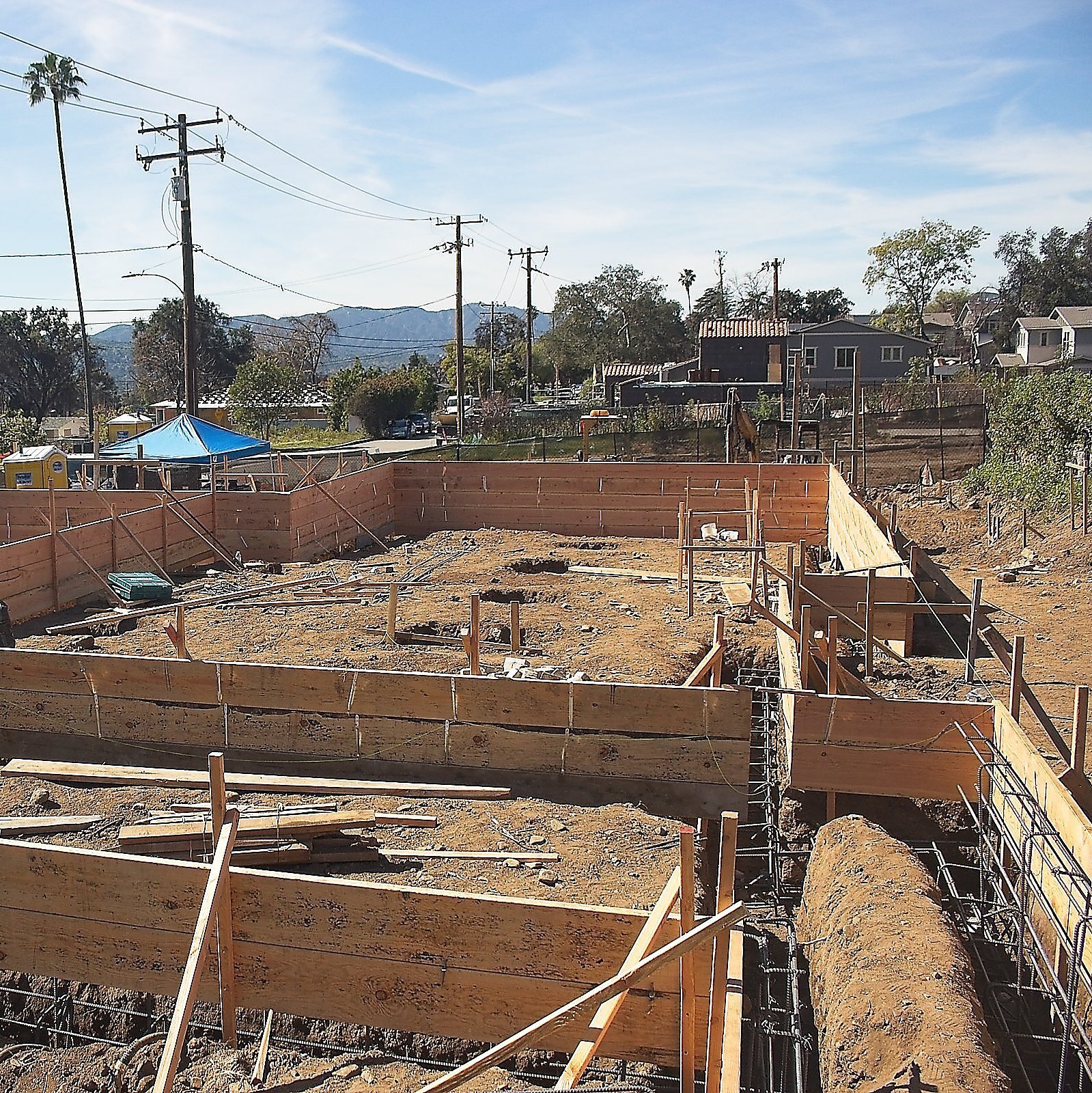 Concrete foundation forms and site preparation for residential home rebuild in Altadena California
